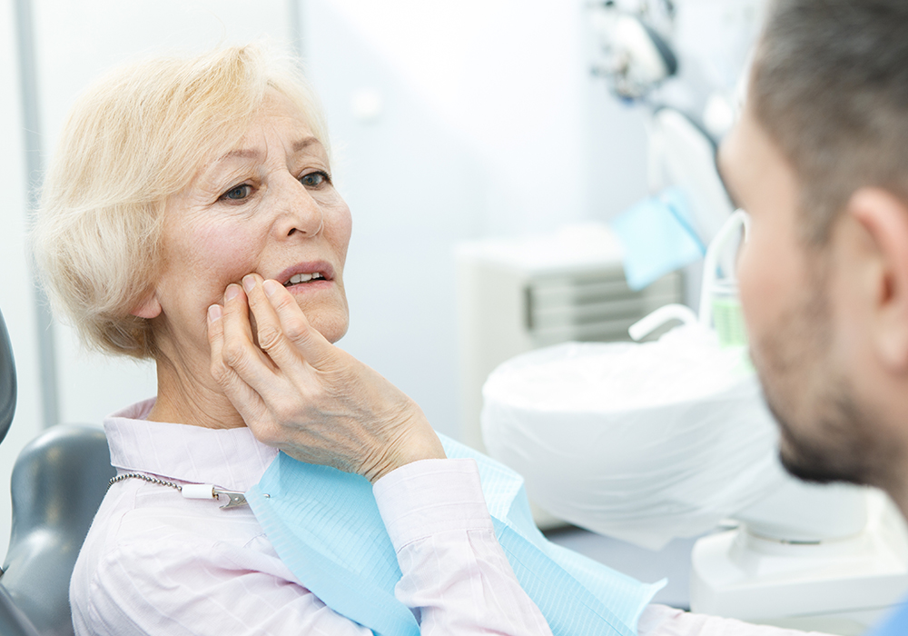 Woman with Denture Issues